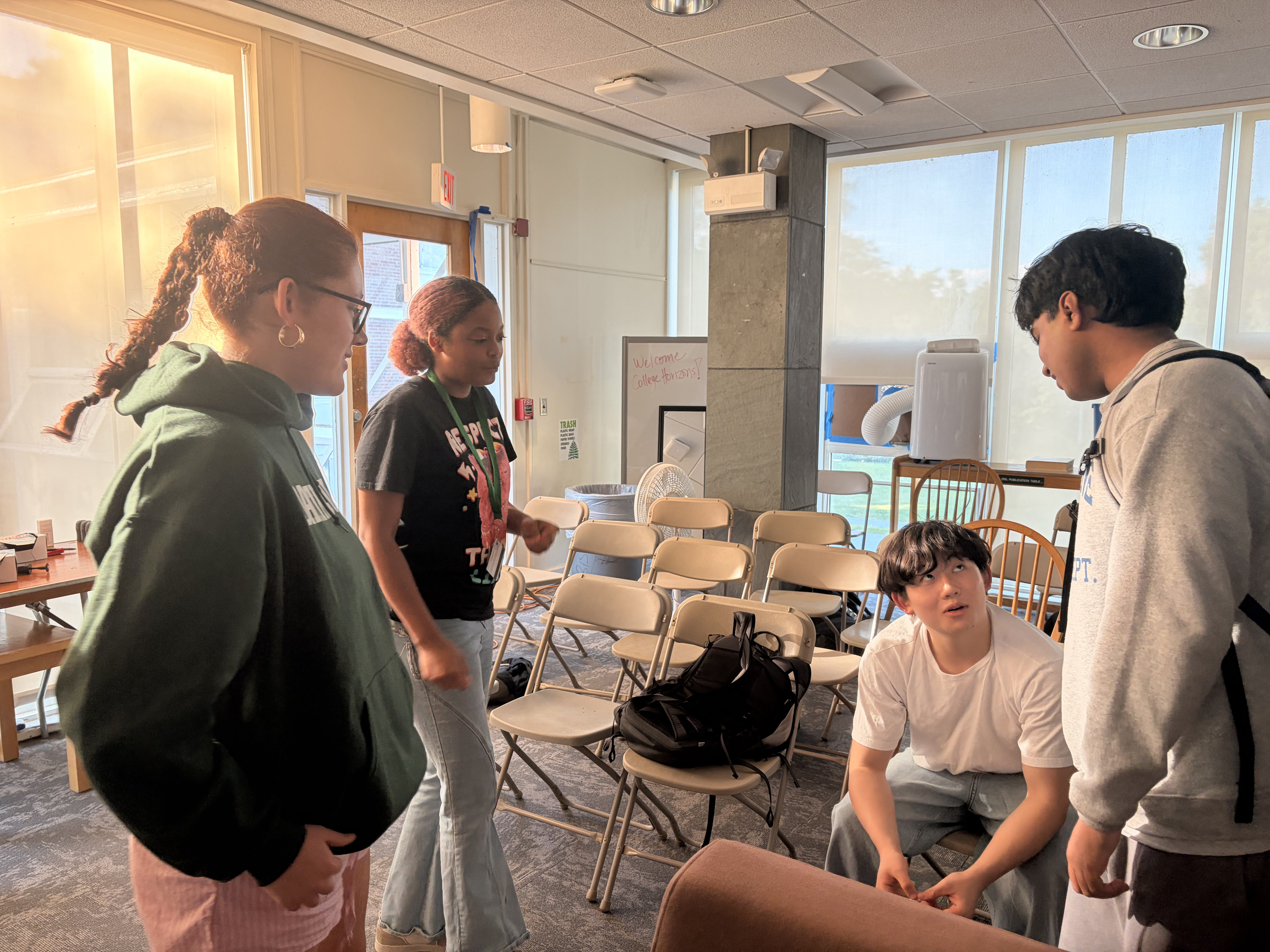 Debaters gathering between sessions